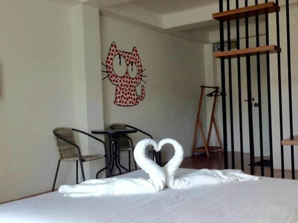 Bed in The Pride Hotel At Laemsing