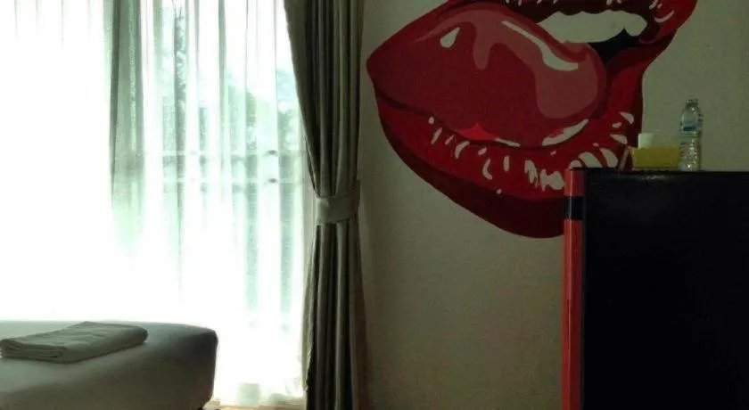 Bed in The Pride Hotel At Laemsing