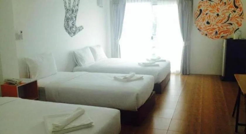 Bed in The Pride Hotel At Laemsing