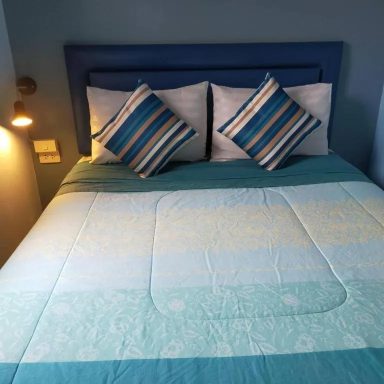 Bed in Palm Sweet Hotel