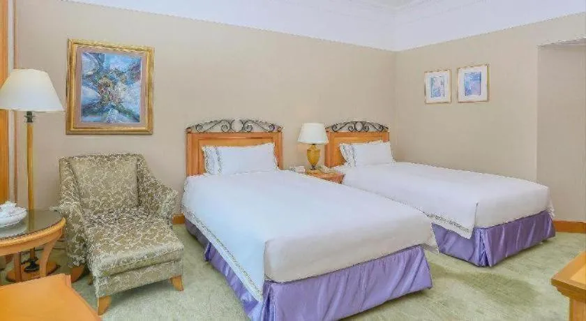 Bed in Regency Hotel