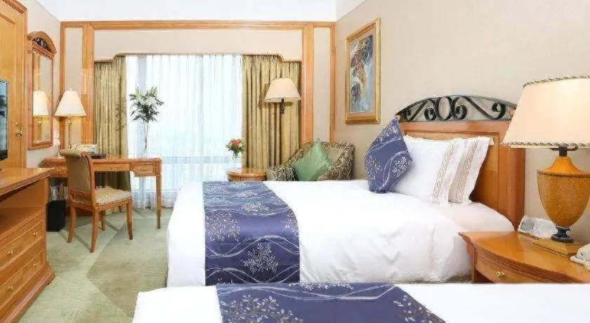 Bed in Regency Hotel