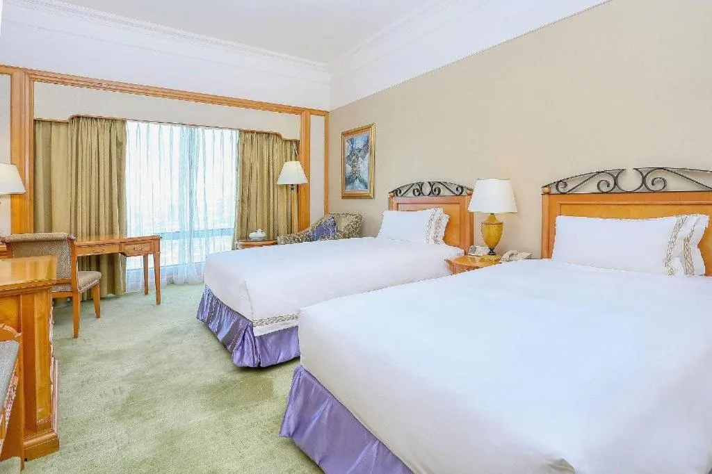 Bed in Regency Hotel