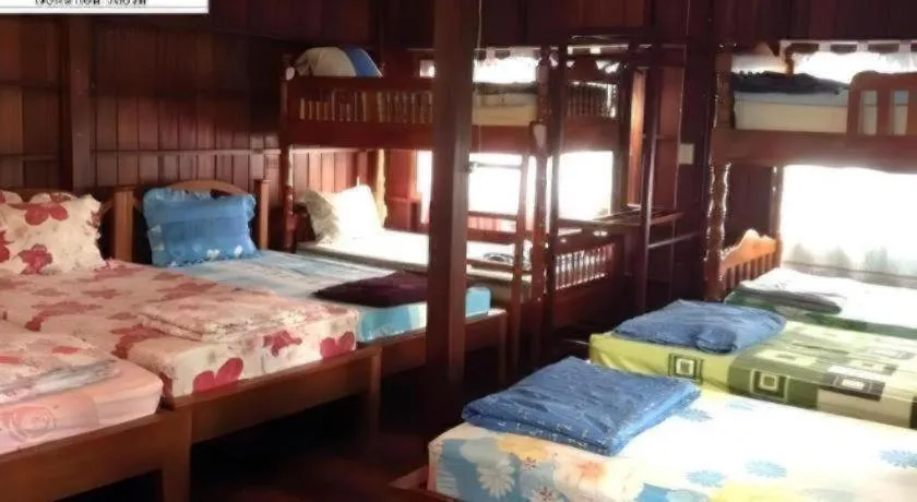 Bed in RuenNamyen Resort Amphawa