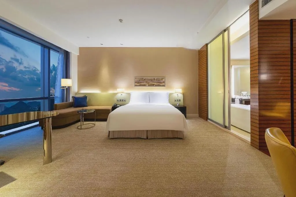 Bed in New World Guiyang Hotel