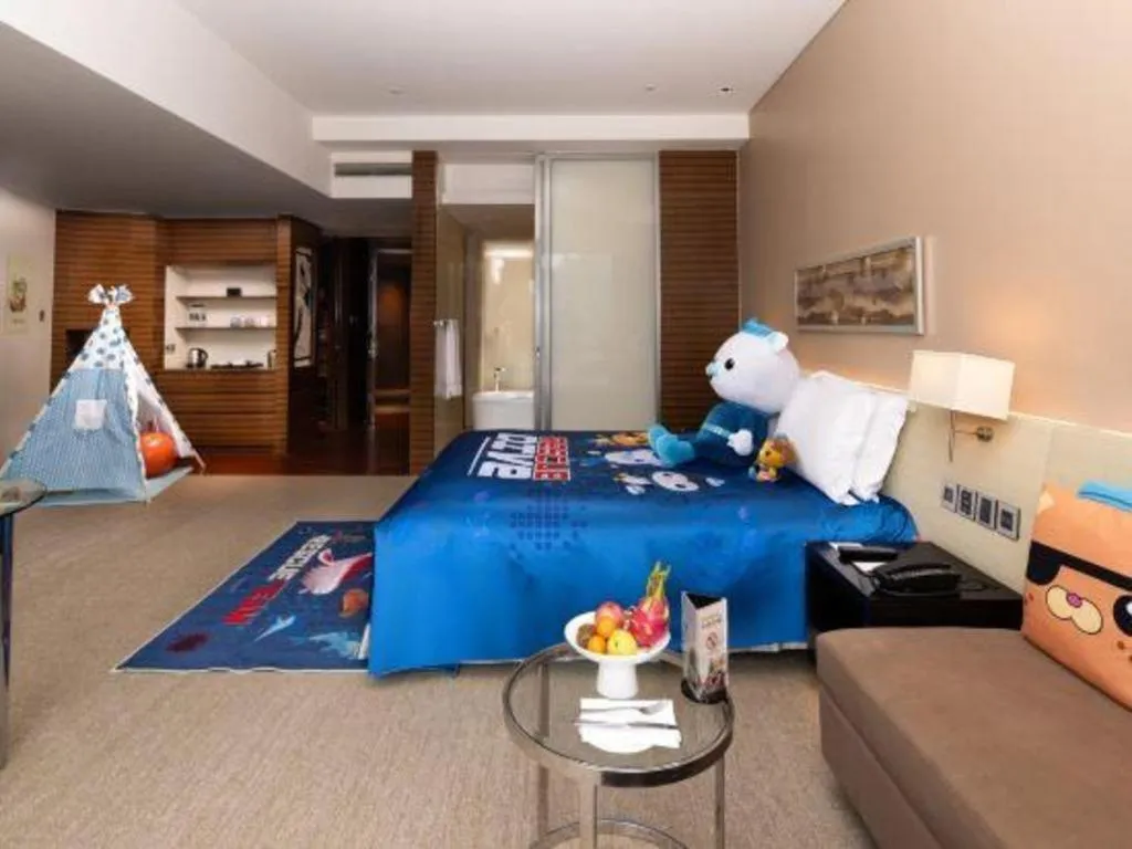 Bed in New World Guiyang Hotel