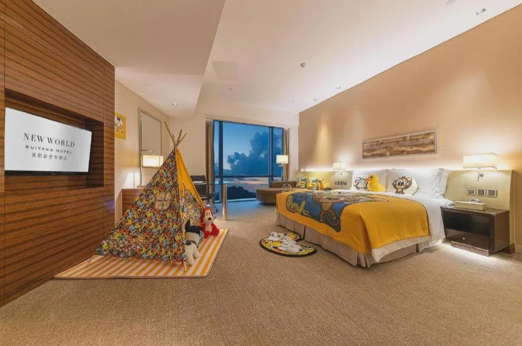 Bed in New World Guiyang Hotel