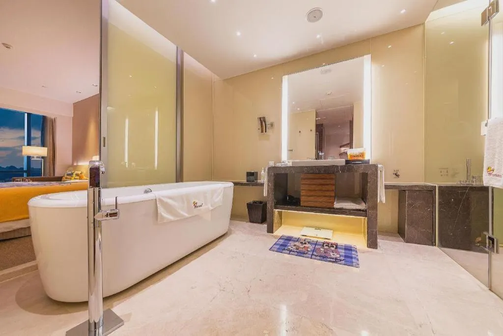 Bed in New World Guiyang Hotel