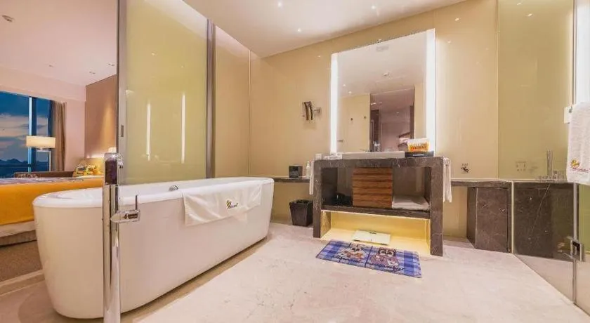 Bed in New World Guiyang Hotel