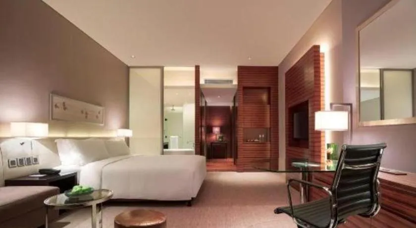 Bed in New World Guiyang Hotel