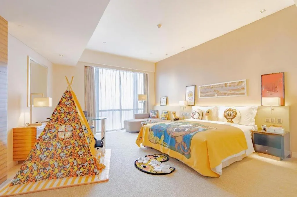 Bed in New World Guiyang Hotel