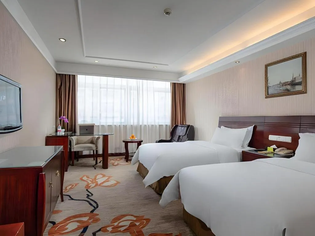 Bed in Vienna Hotel Hangzhou Binkang Road Metro Station