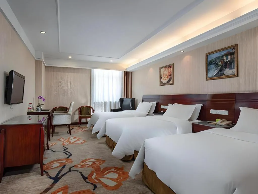 Bed in Vienna Hotel Hangzhou Binkang Road Metro Station