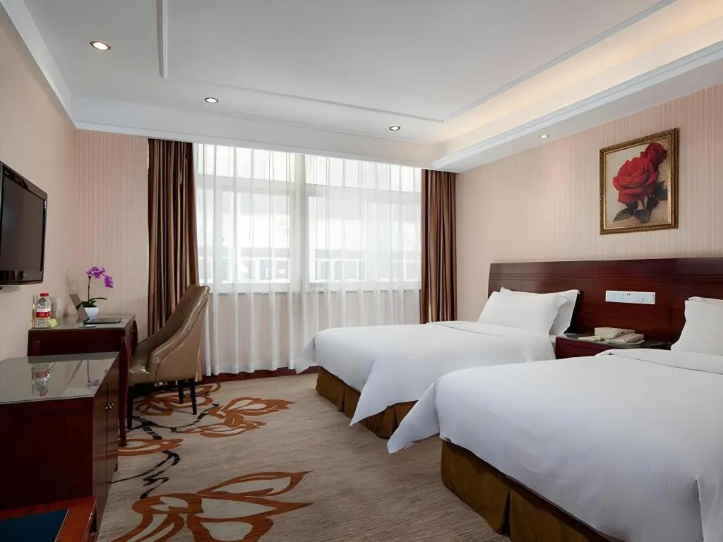 Bed in Vienna Hotel Hangzhou Binkang Road Metro Station