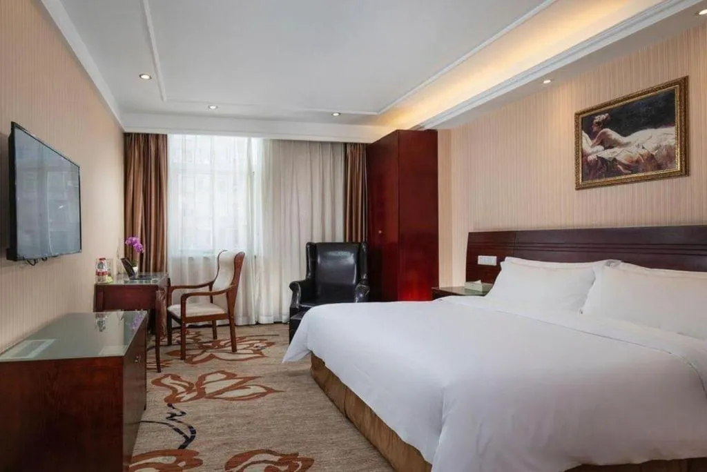 Bed in Vienna Hotel Hangzhou Binkang Road Metro Station