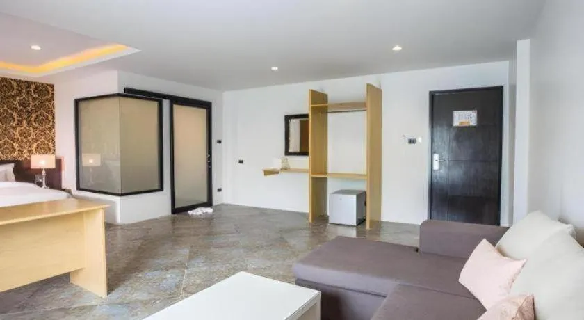 Bed in M Boutique Resort