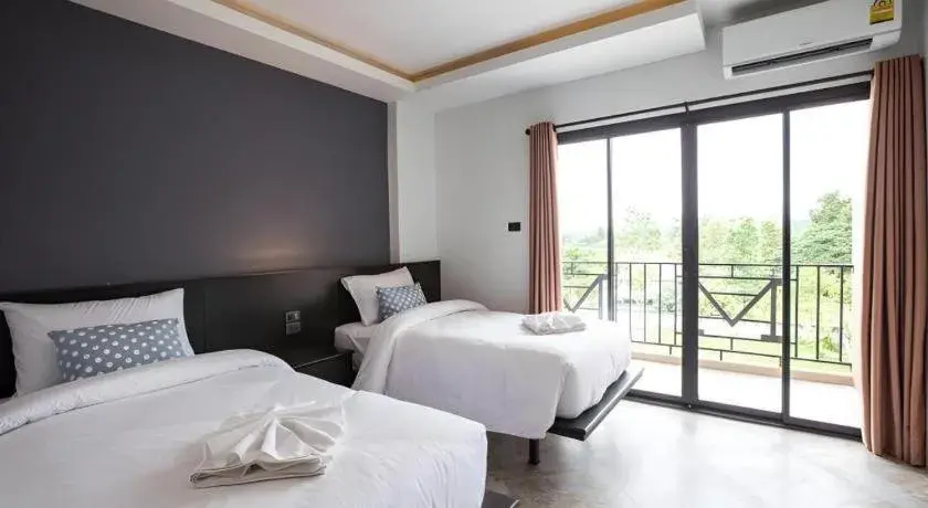 Bed in M Boutique Resort Bed in M Boutique Resort