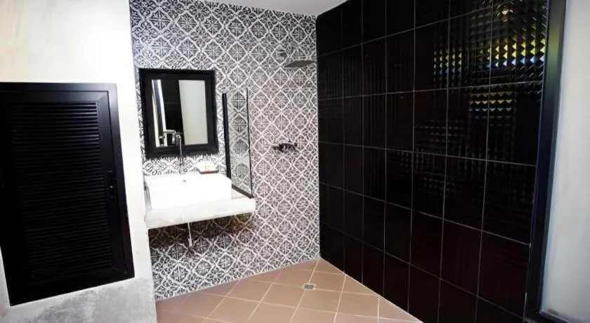 Bed in M Boutique Resort