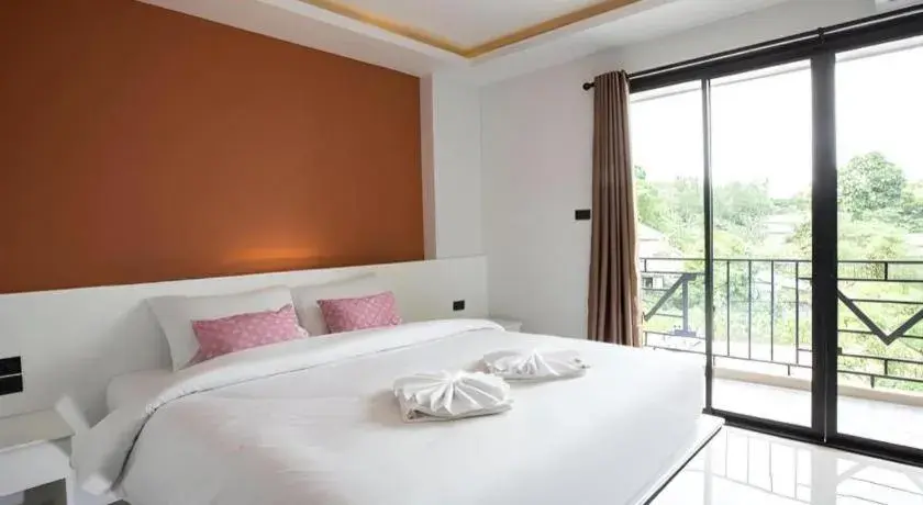 Bed in M Boutique Resort Bed in M Boutique Resort