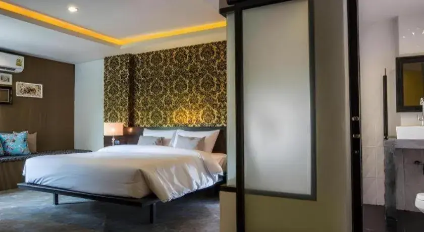 Bed in M Boutique Resort Bed in M Boutique Resort