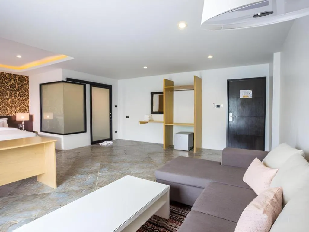 Bed in M Boutique Resort