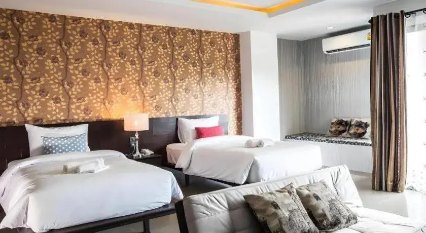 Bed in M Boutique Resort Bed in M Boutique Resort