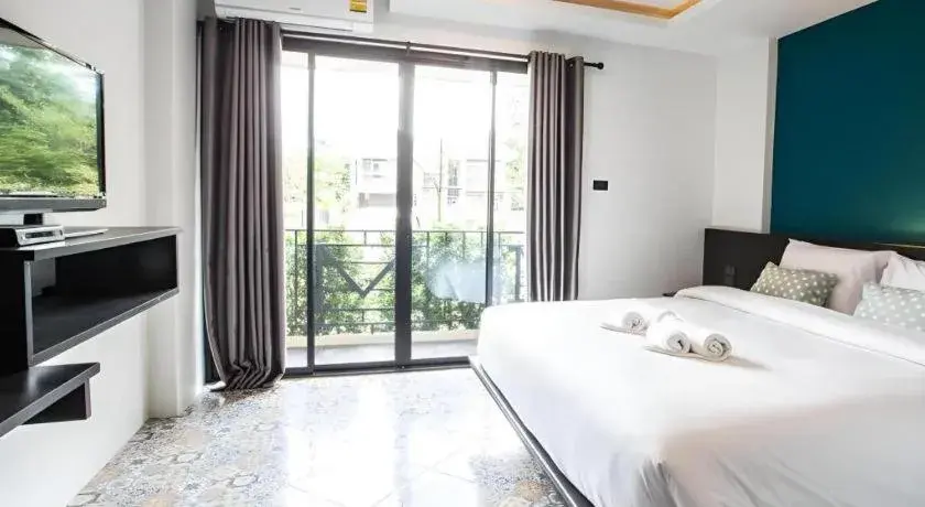 Bed in M Boutique Resort Bed in M Boutique Resort