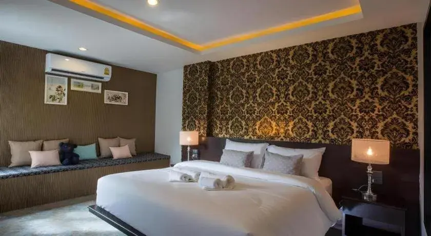 Bed in M Boutique Resort Bed in M Boutique Resort