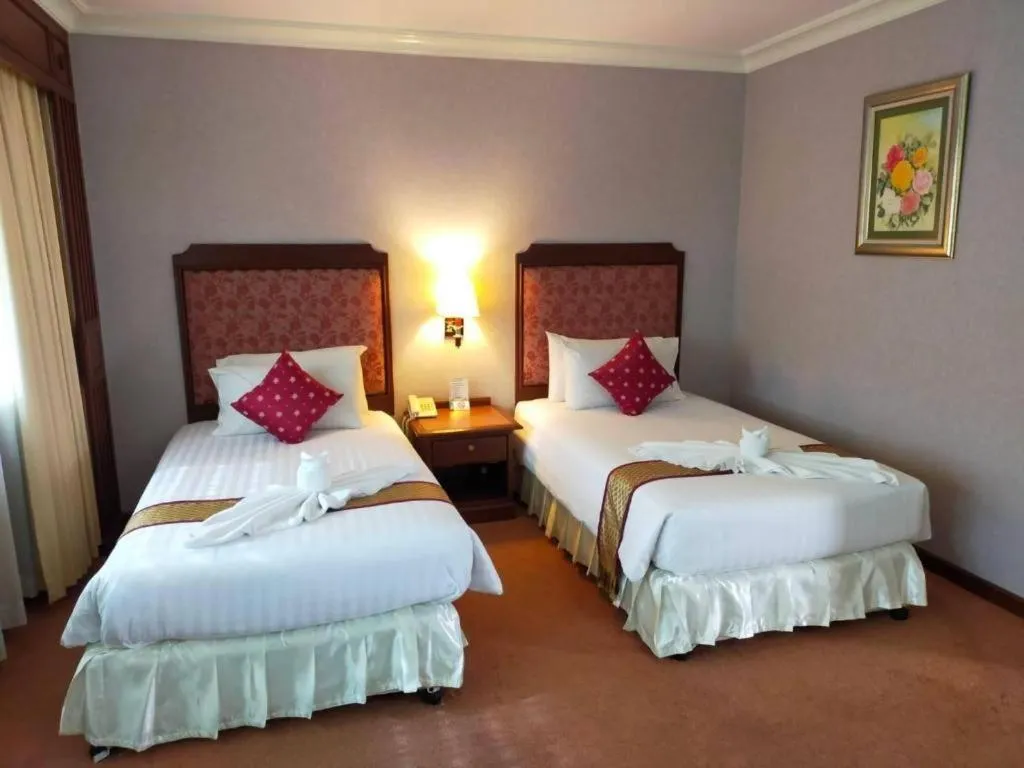 Bed in Grand Vissanu Hotel