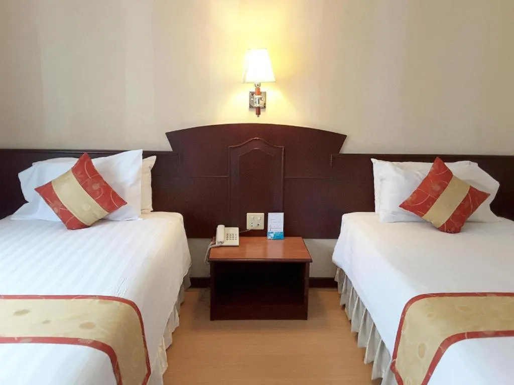 Bed in Grand Vissanu Hotel