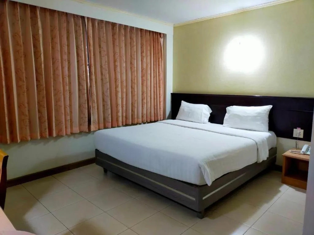 Bed in Grand Vissanu Hotel