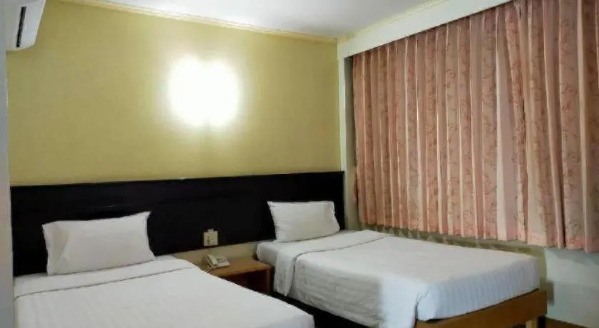 Bed in Grand Vissanu Hotel