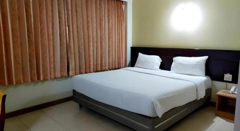 Bed in Grand Vissanu Hotel