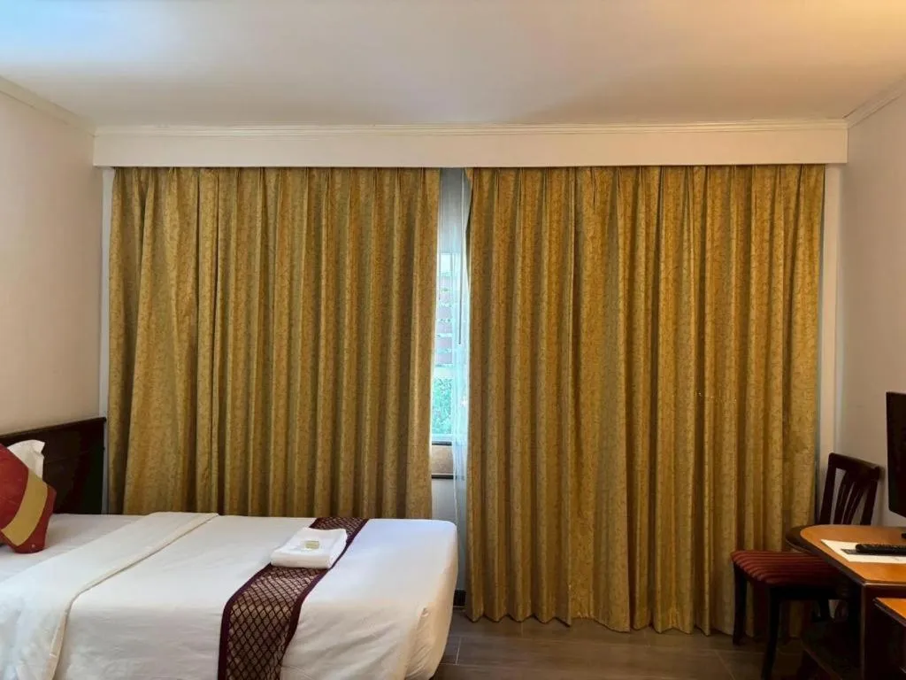 Bed in Grand Vissanu Hotel