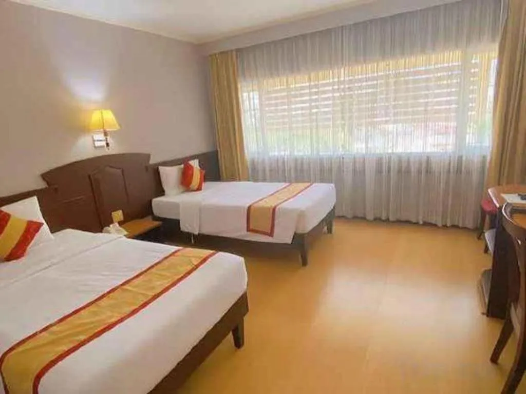 Bed in Grand Vissanu Hotel