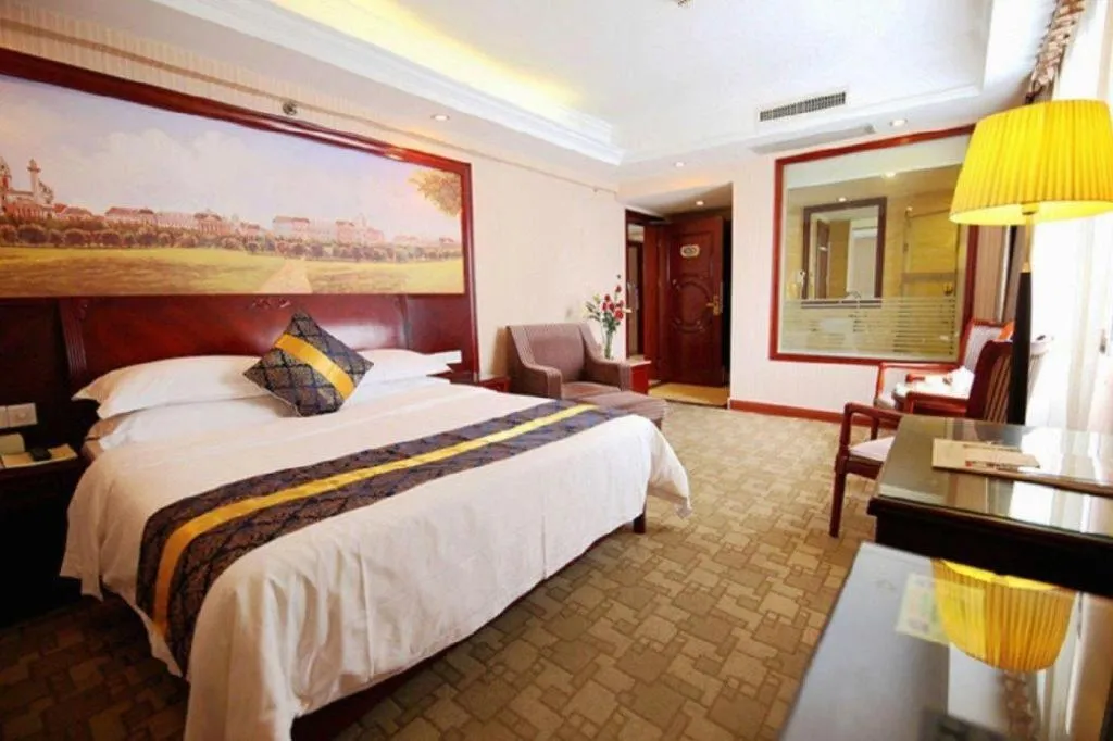 Bed in Vienna Hotel Nanning Train Station