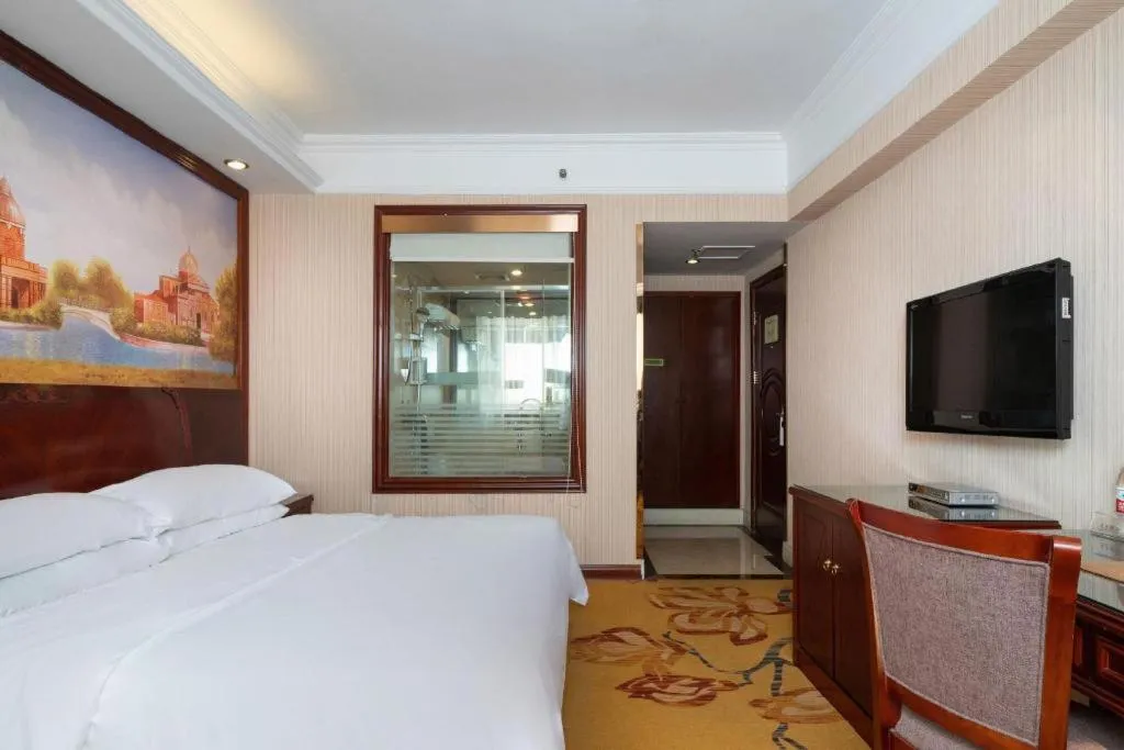 Bed in Vienna Hotel Nanning Train Station