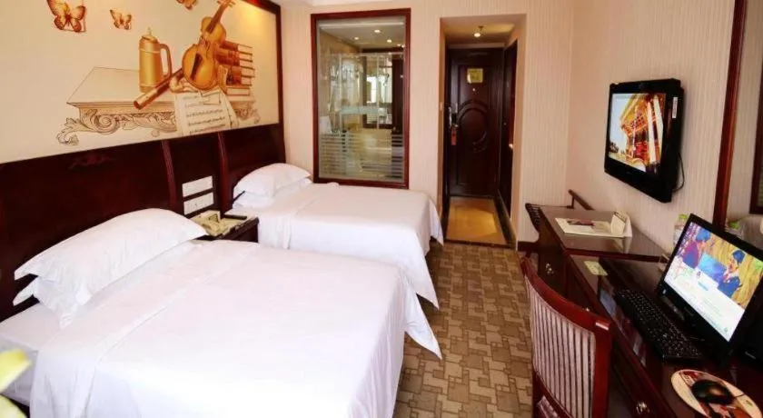 Bed in Vienna Hotel Nanning Train Station