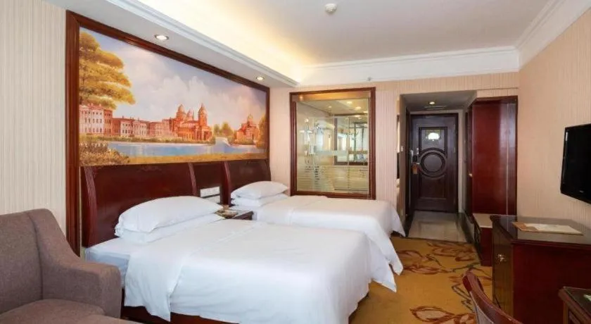 Bed in Vienna Hotel Nanning Train Station