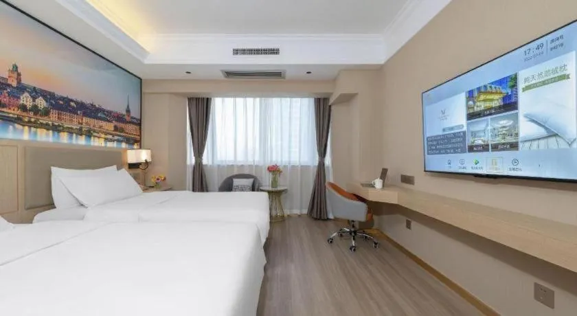 Bed in Vienna Hotel Nanning Train Station