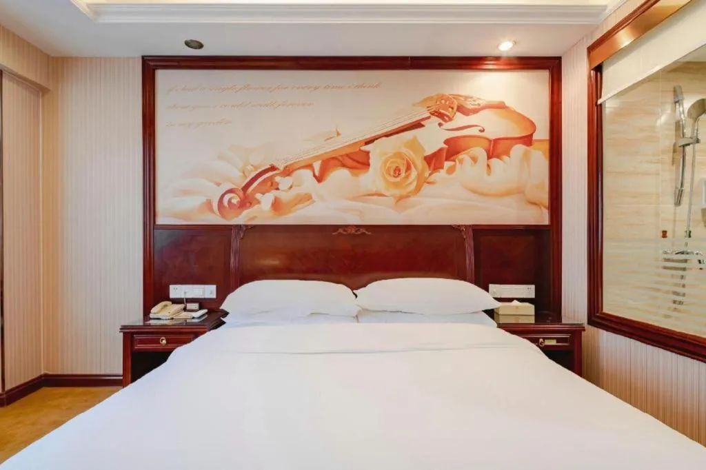 Bed in Vienna Hotel Nanning Train Station