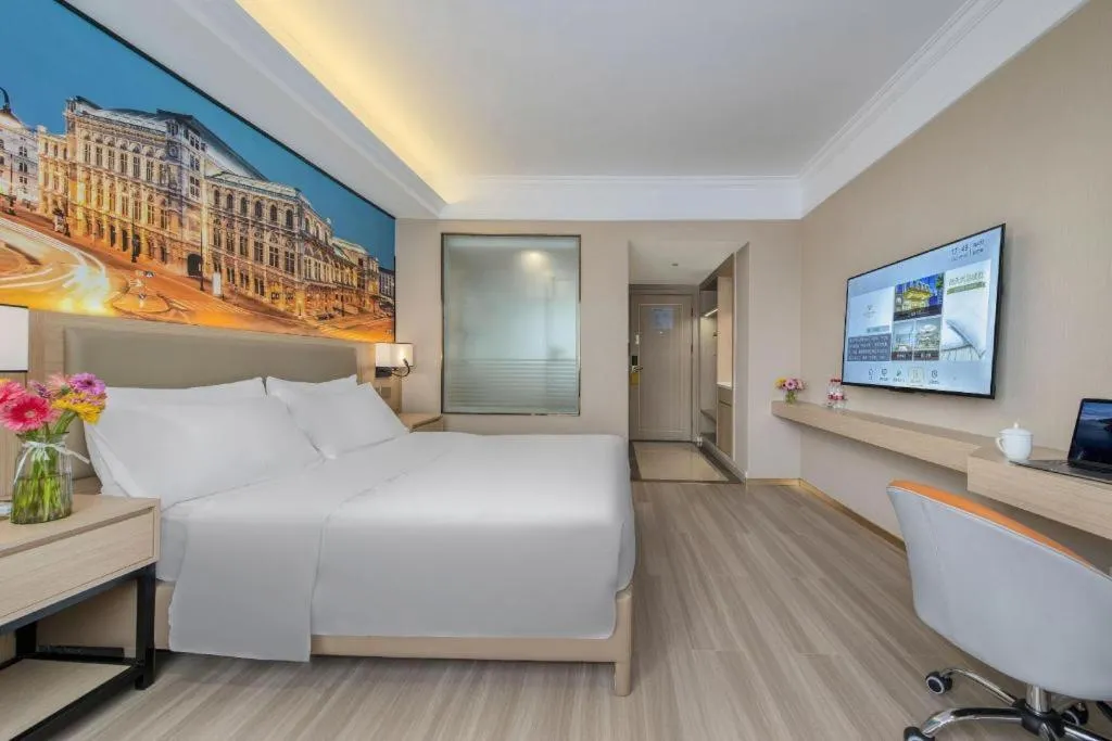 Bed in Vienna Hotel Nanning Train Station