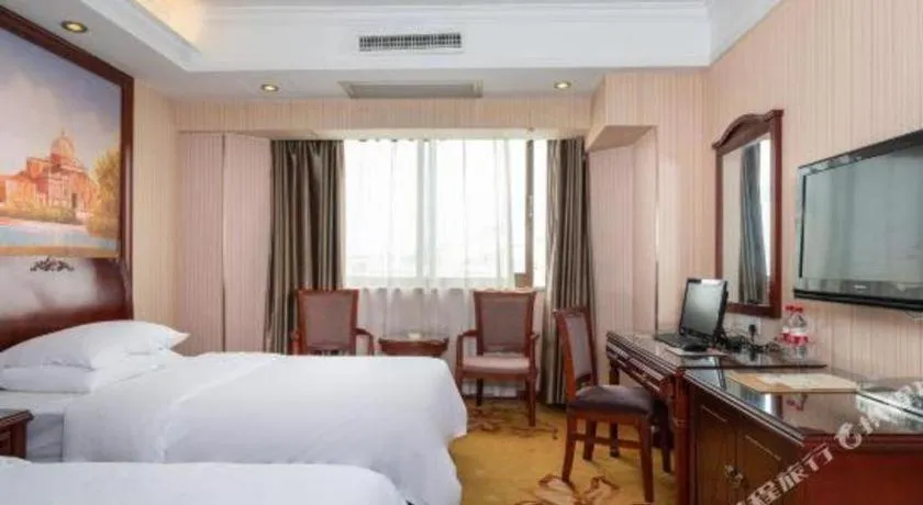 Bed in Vienna Hotel Nanning Train Station