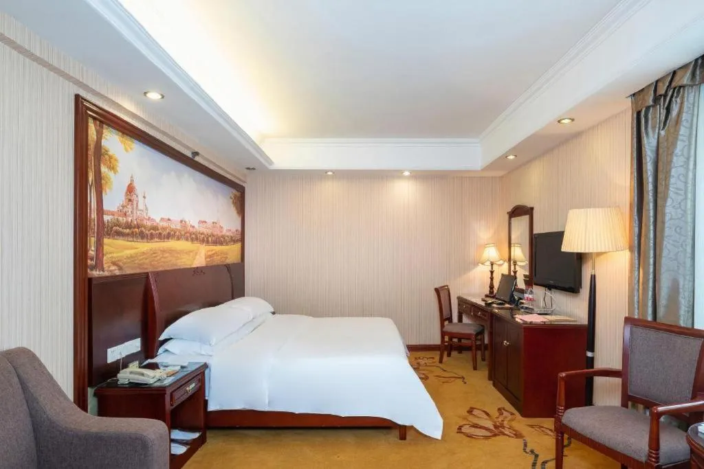 Bed in Vienna Hotel Nanning Train Station