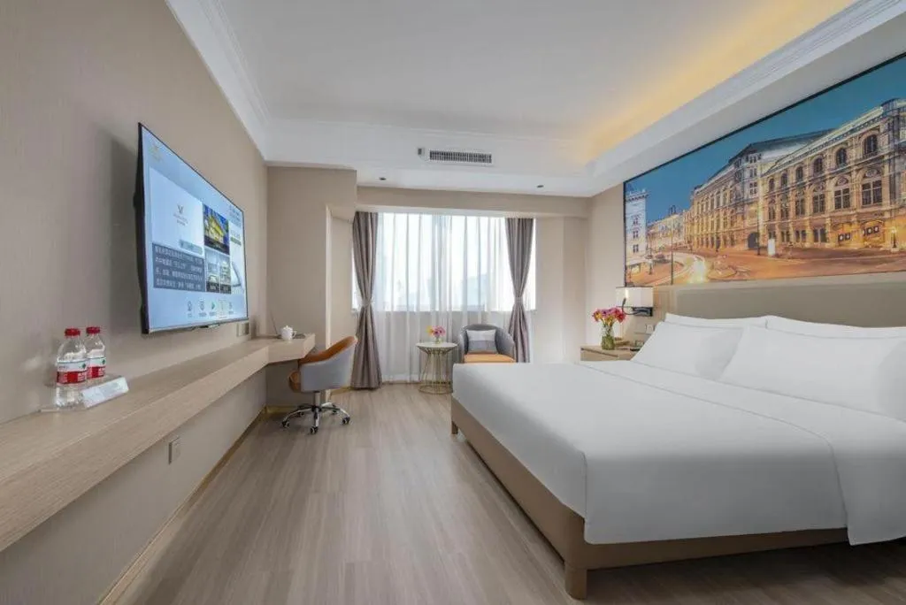 Bed in Vienna Hotel Nanning Train Station