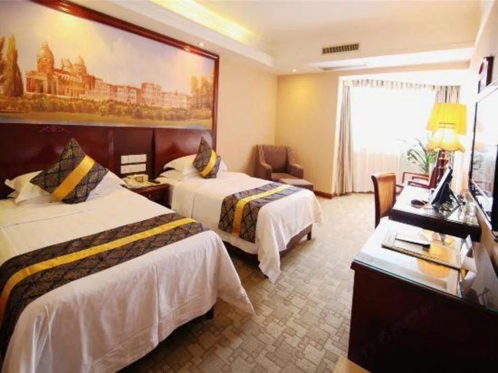 Bed in Vienna Hotel Nanning Train Station