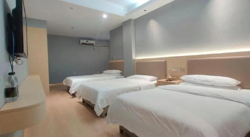 Bed in Vienna Hotel Nanning Train Station