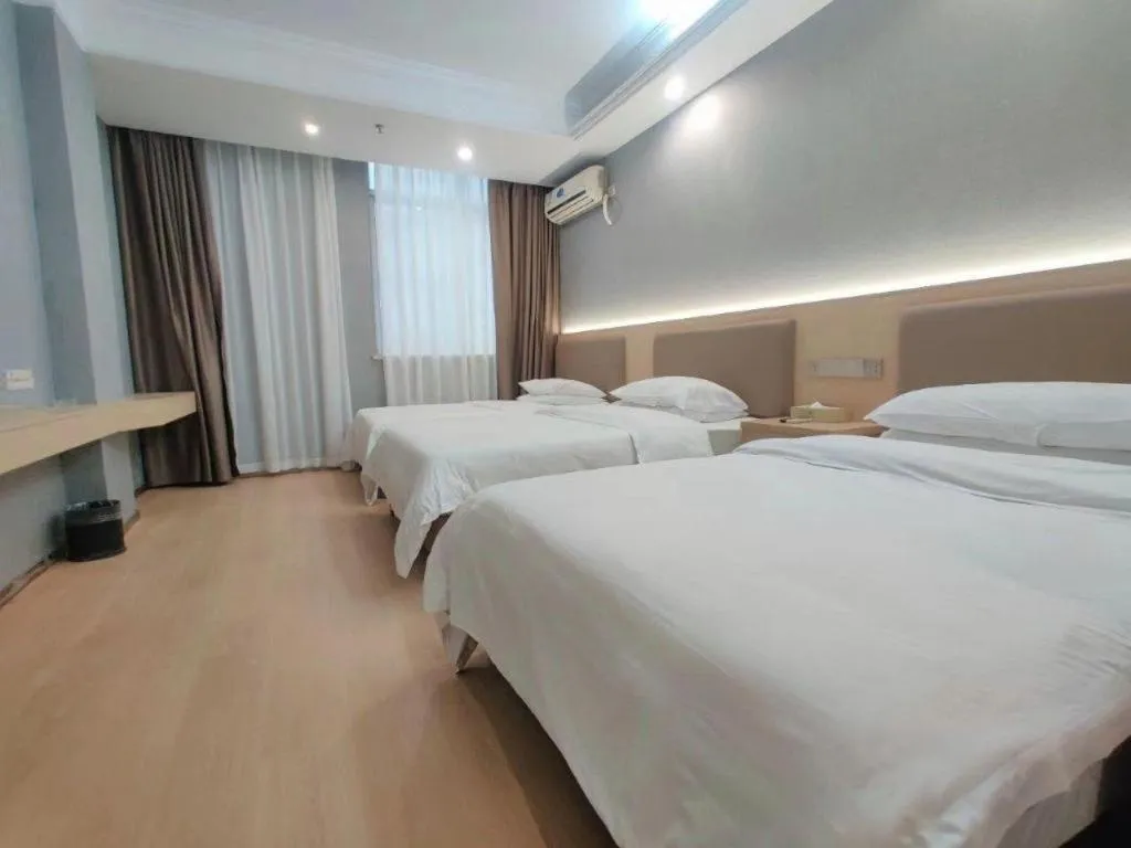 Bed in Vienna Hotel Nanning Train Station