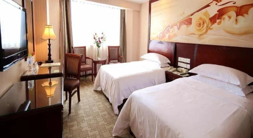 Bed in Vienna Hotel Nanning Train Station