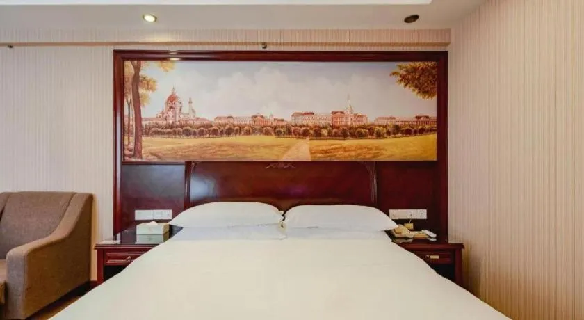 Bed in Vienna Hotel Nanning Train Station